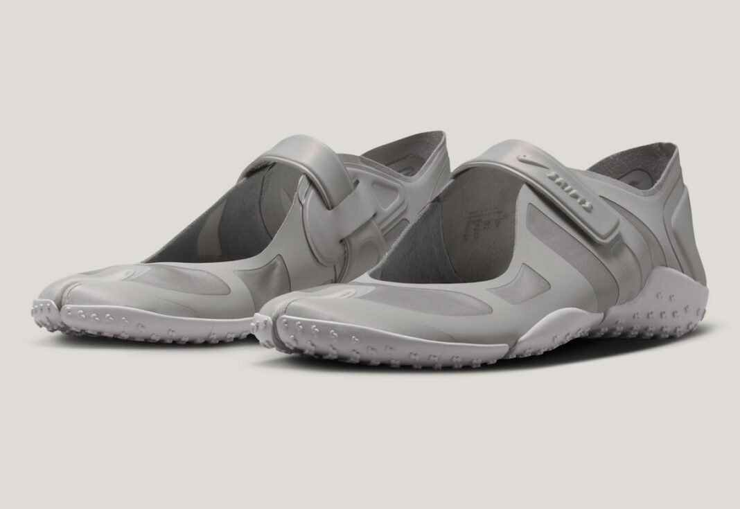 Nike SKIMS Rift Satin in Night Silver with tonal grey colorway, showing split-toe design and stretch textile upper with molded support panels
