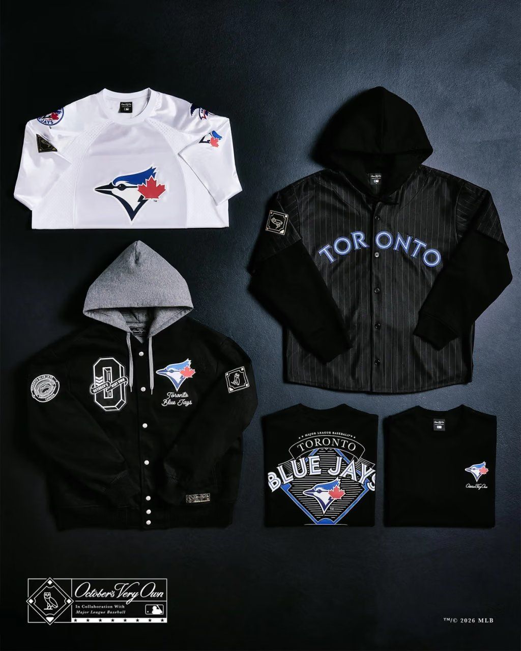 OVO x MLB collaboration collection product shot featuring October's Very Own and Major League Baseball branded pieces