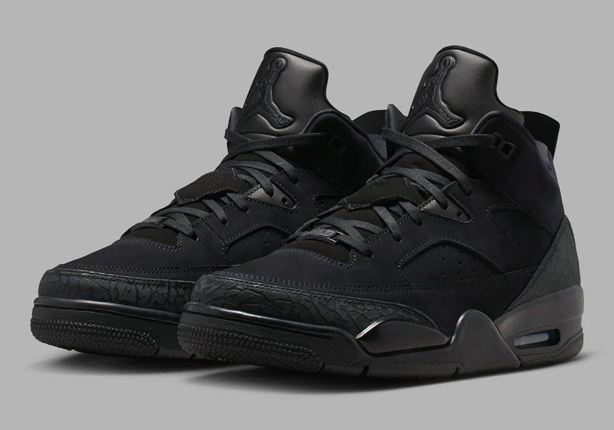 Jordan Son Of Mars Low in Black Cat colorway, full monochromatic black upper with visible Air unit and hybrid design elements from Air Jordan 3-6