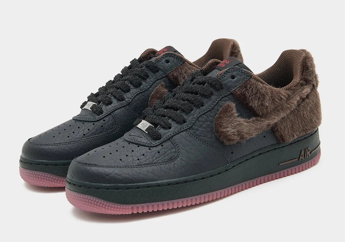 Nike Air Force 1 Black Rat with furry Swoosh, tumbled leather, and pale pink midsole detail