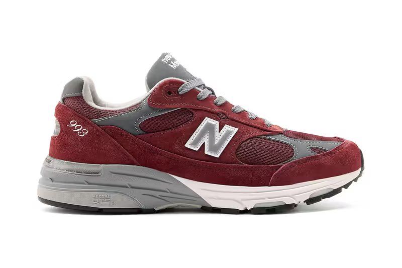 New Balance 993 Made in USA in Burgundy colorway, side profile showing mesh and suede construction