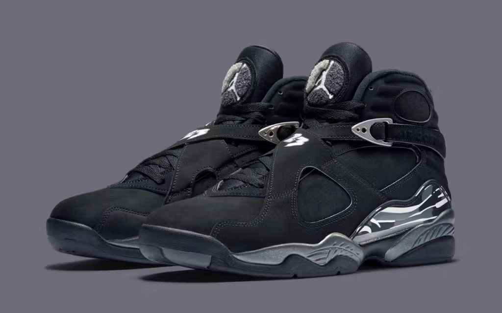 Air Jordan 8 Chrome metallic retro sneaker, side profile view showing reflective upper and iconic Air Jordan 8 silhouette