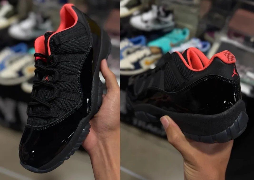 Air Jordan 11 Low Black Infrared sample featuring all-black patent leather upper with infrared sockliner and Jumpman branding
