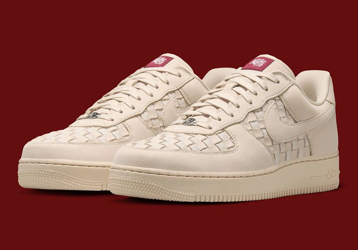 Nike Air Force 1 Low Woven in white with chunky woven panels and retro cursive tongue branding
