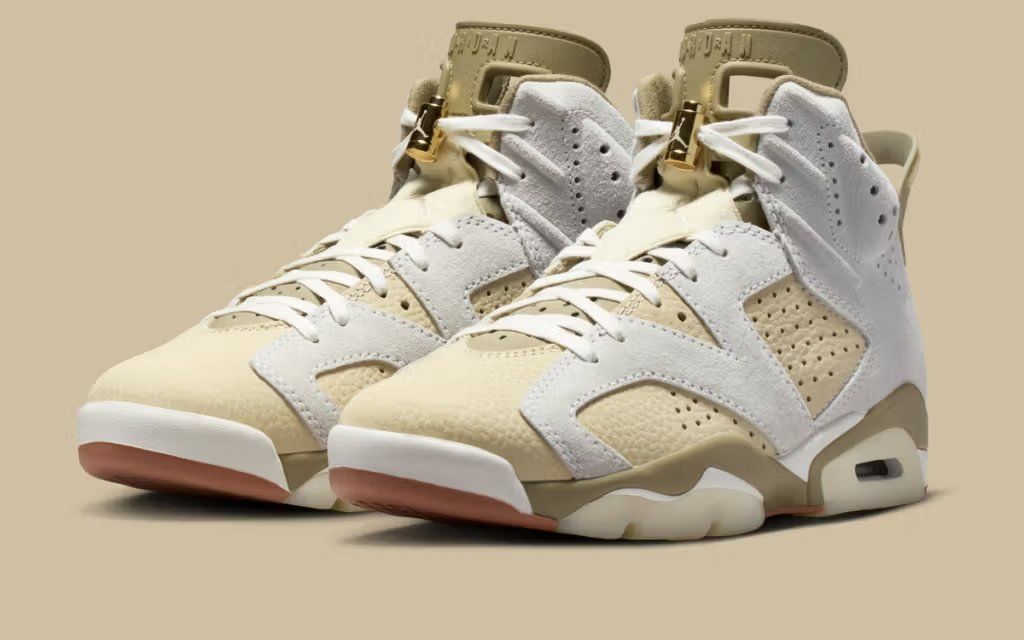 Women's Air Jordan 6 in Sail and Neutral Olive colorway, showing profile view of the iconic silhouette with earth-tone palette
