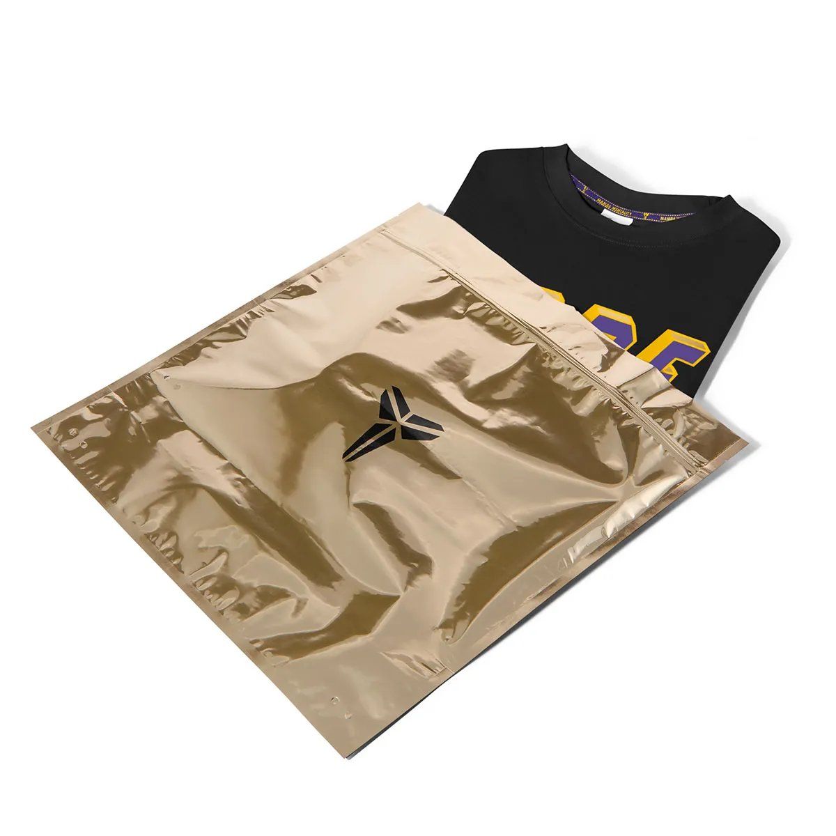 Nike Kobe Draft Day T-shirt collection in sealed blind-bag packaging, featuring team colorways from the 1996 NBA Draft