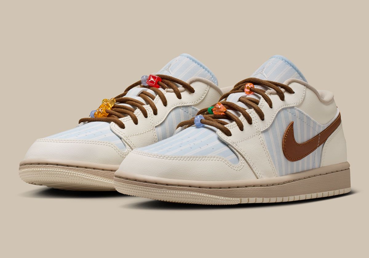Air Jordan 1 Low SE Pinstripes in light blue and white striped detail with cream leather overlays and dark brown Swoosh