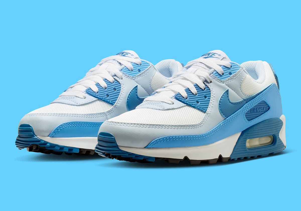 Nike Air Max 90 Argon Blue colorway with white and grey base, blue accents across upper and collar