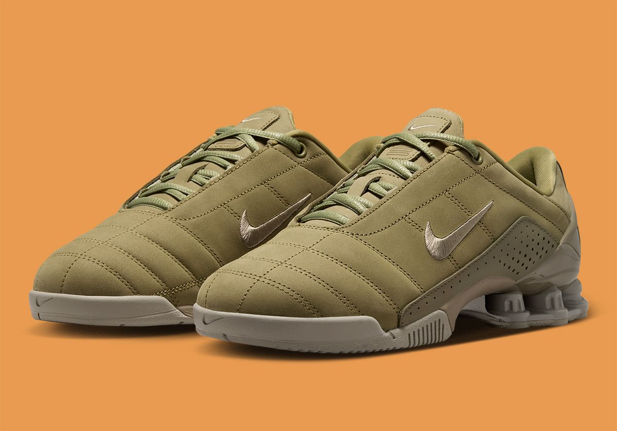 Nike Total 90 Shox Magia in Neutral Olive suede colorway, side profile view showing hybrid Total 90 soccer and Shox platform silhouette