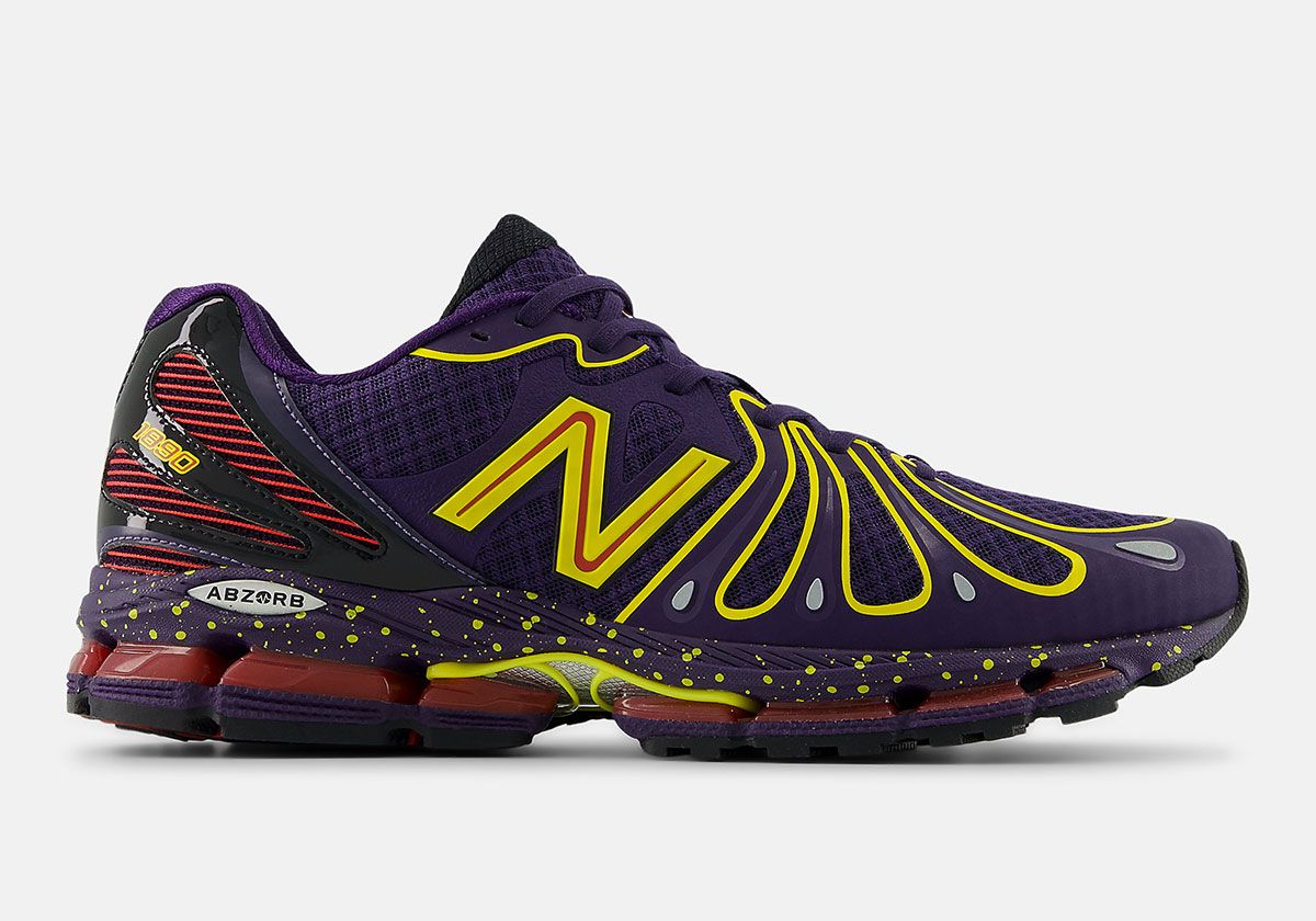 New Balance 1890 Boysenberry with purple upper, speckled sole, and crimson heel mesh accent