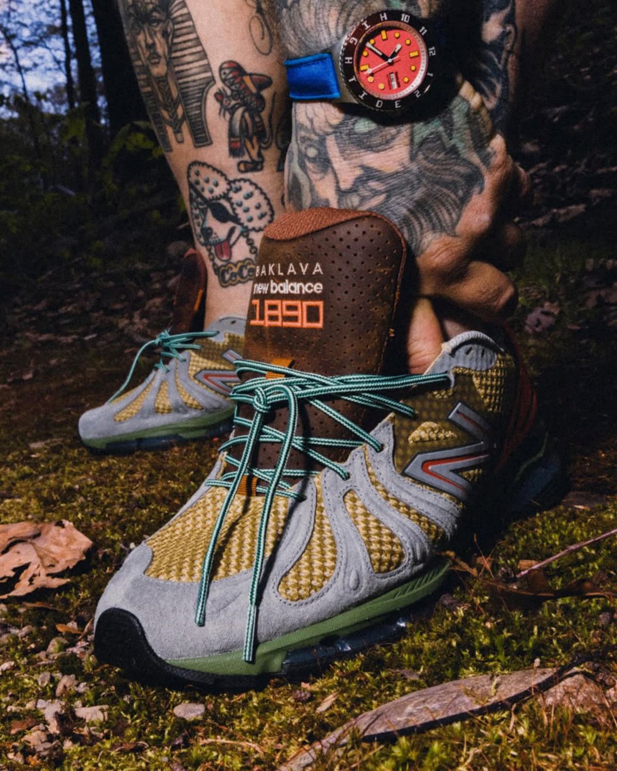 Action Bronson x New Balance 1890 Planet Frog colorway featuring olive, pink, and royal blue accents on beige mesh and grey suede