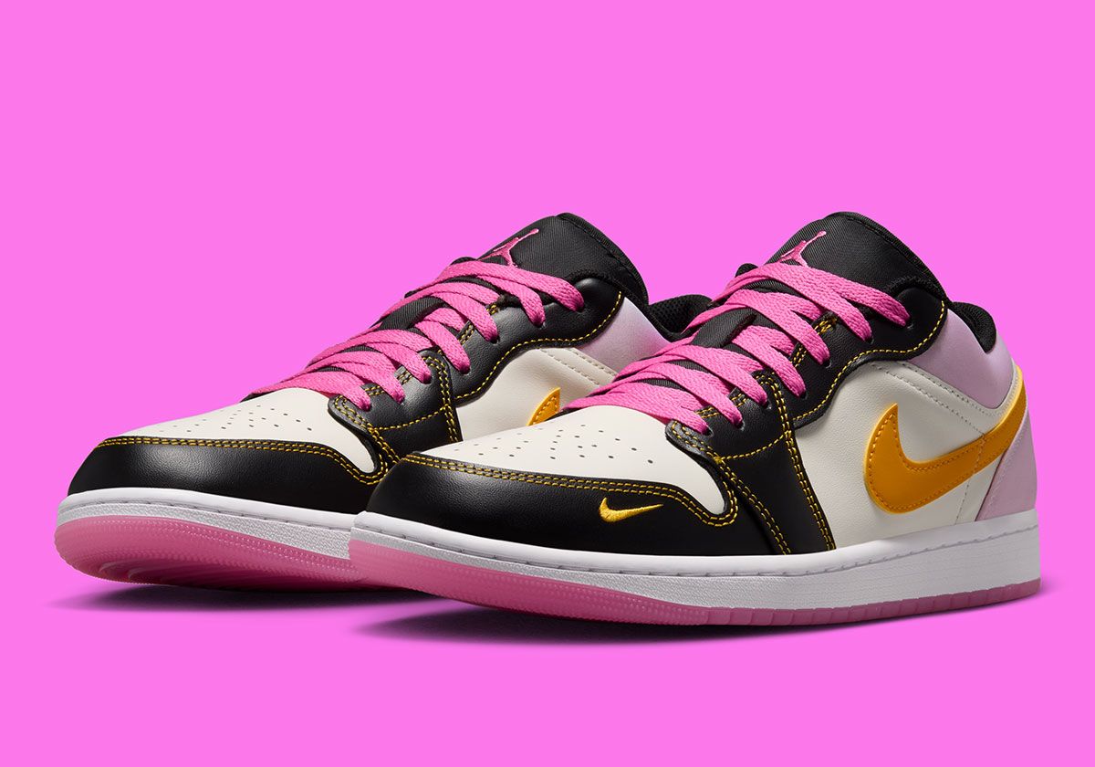 Air Jordan 1 Low SE in Sherbet colorway featuring Sail leather, black forefoot, University Gold accents, and Pinksicle outsole
