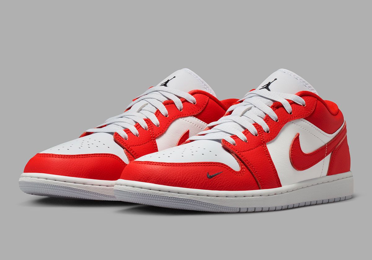 Air Jordan 1 Low Chile Red featuring miniaturized Swoosh detail on toe box with red leather upper and gray-white base