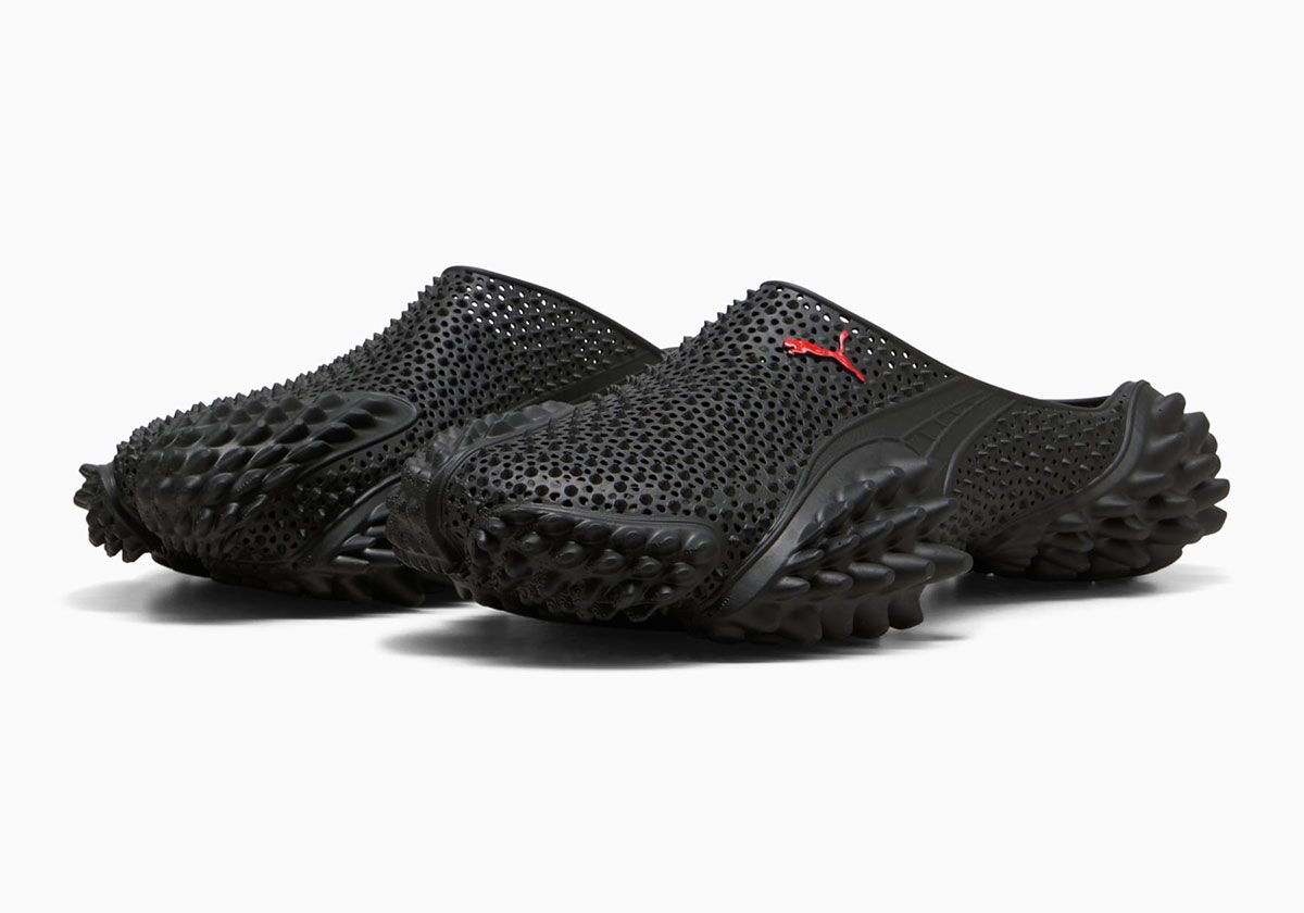 A$AP Rocky x Puma Mostro Mule backless slip-on in Blue Glimmer colorway, showing sculptural upper and aggressive outsole tooling