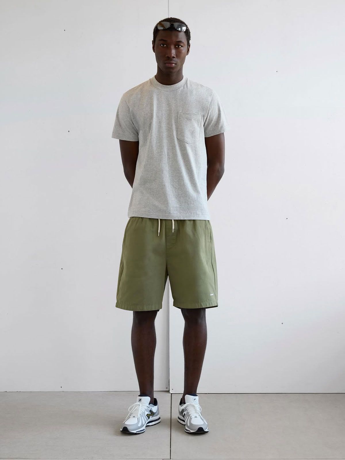 JJJJound x New Balance 1890 in white with grey overlays and yellow and navy blue accents