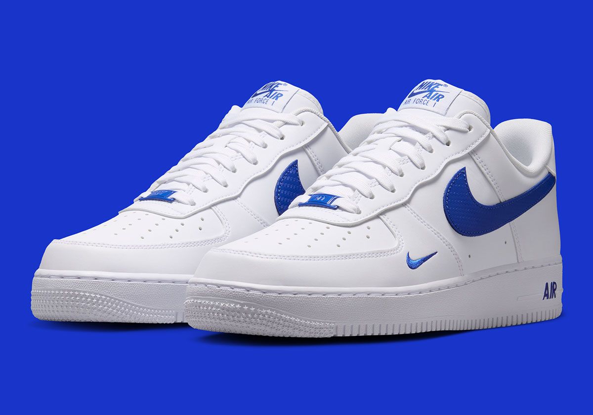 Nike Air Force 1 Low in White with Game Royal carbon fiber Swoosh and accents, lateral view