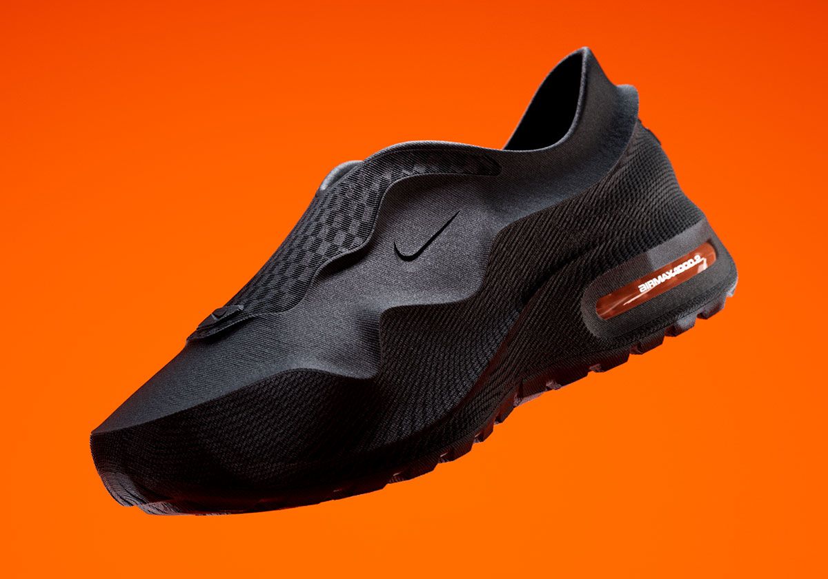 Nike Air Max 1000.2 in Black with Hyper Crimson Air units, showing retooled outsole geometry and side profile