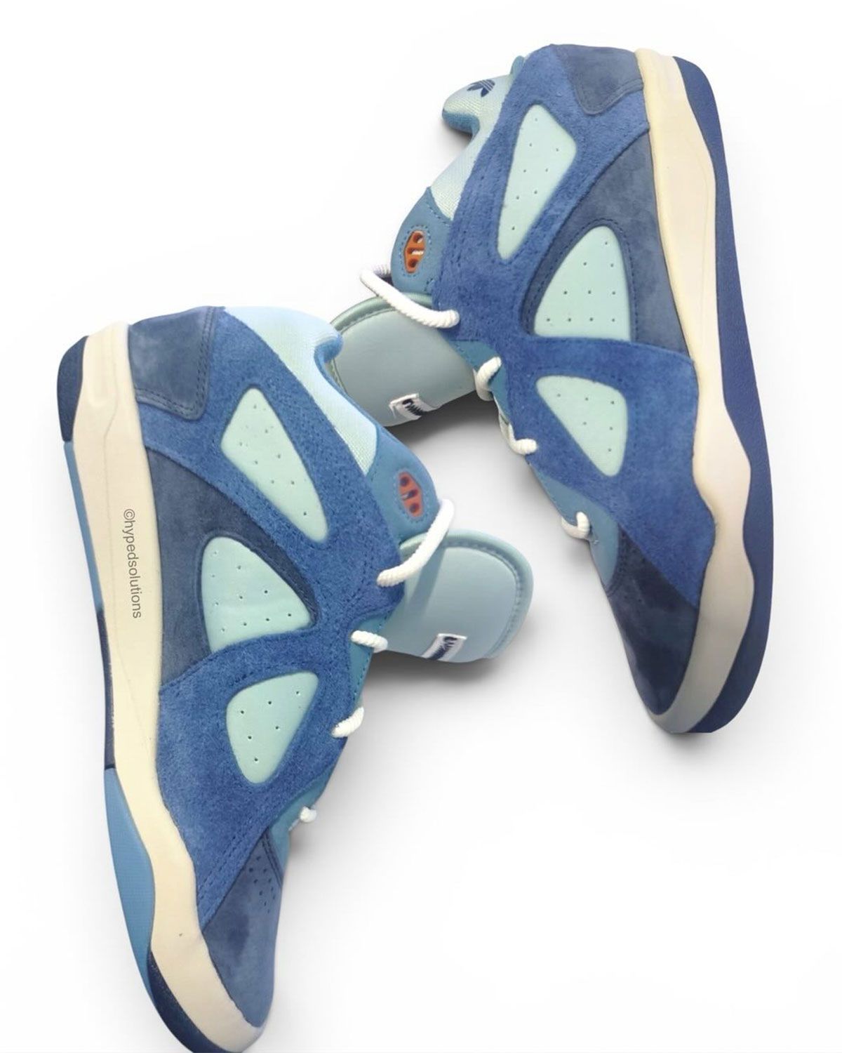 adidas BadBo 1.0 Night Navy colorway featuring royal, light blue, and navy suede, mesh, and leather construction with cream-aged sole and Bad Bunny signature design elements