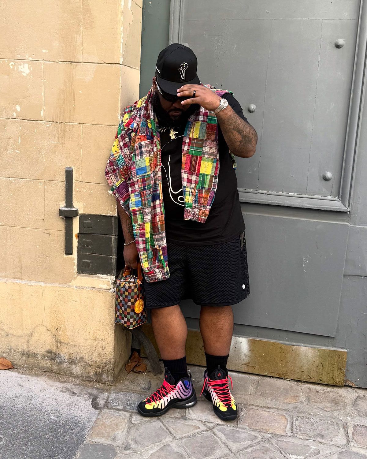 Jae Tips x Nike Air Bakin' Low in Cobalt Bliss, Chile Red, and Varsity Maize colorway, showcasing multi-tonal design