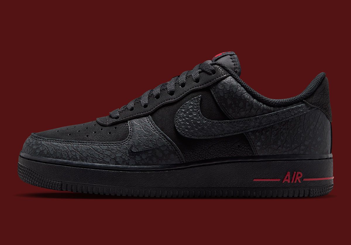Nike Air Force 1 Low in black with safari print Swoosh and elephant print heel detail