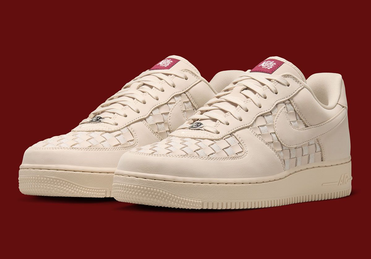 Nike Air Force 1 Low Woven in white with chunky woven panels and retro cursive tongue branding