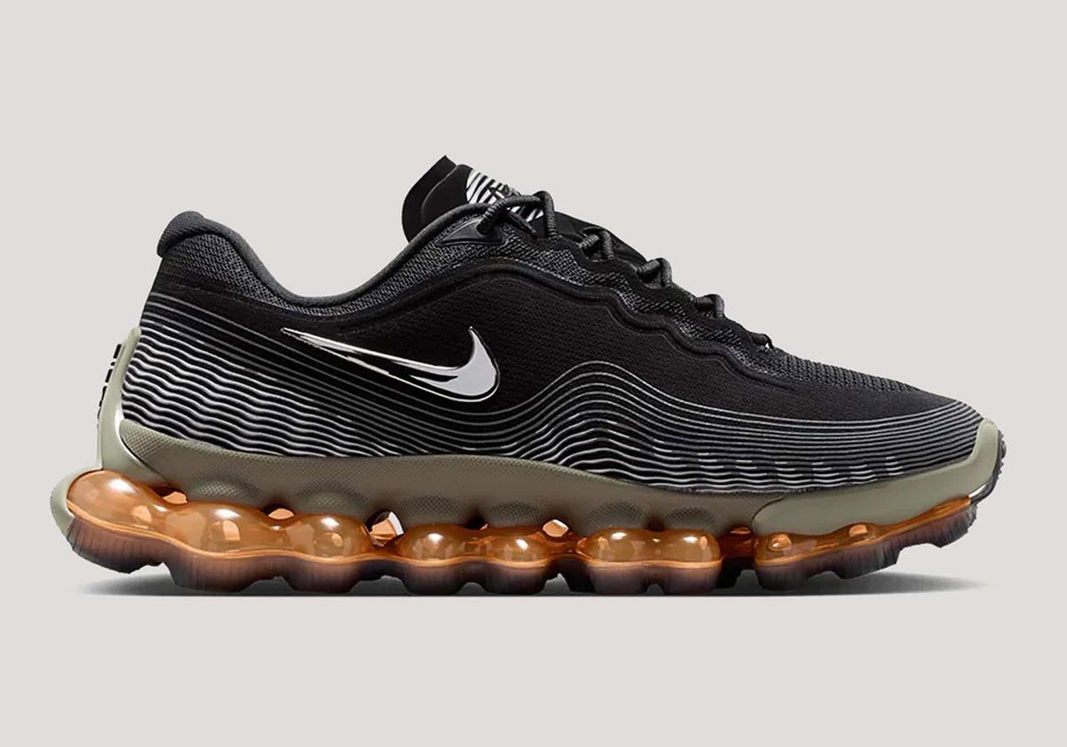 Nike Air Liquid Max Black Metallic with wavy line graphics and chrome Swoosh detail, lateral view