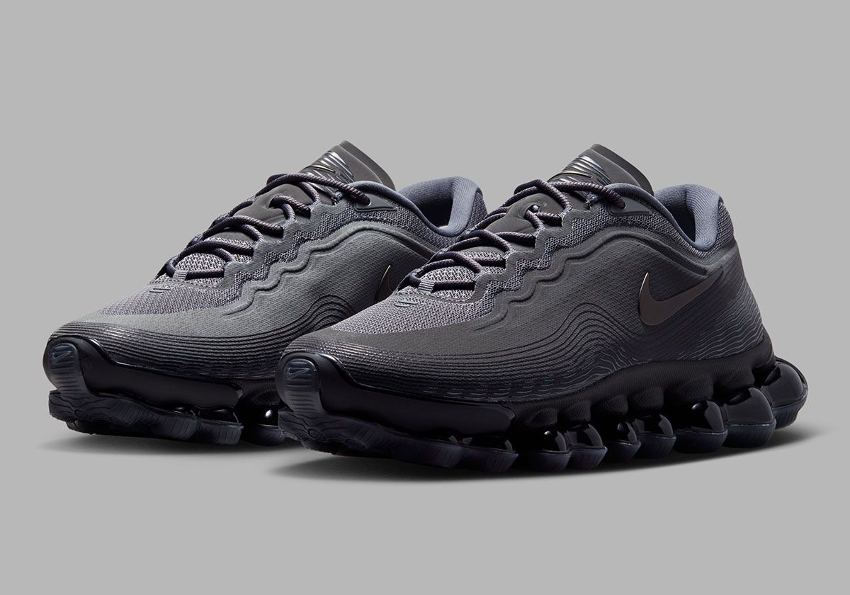 Nike Air Liquid Max in Team Grey colorway showing futuristic upper construction and wavy design details