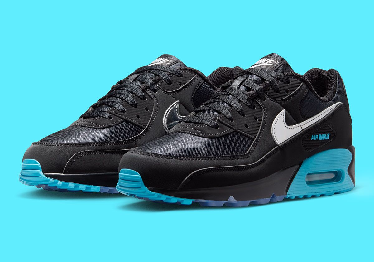 Nike Air Max 90 'Scorpion' in Black/Gamma Blue/Ice/Chrome showing scorpion branding on heel tab and Gamma Blue midsole accents