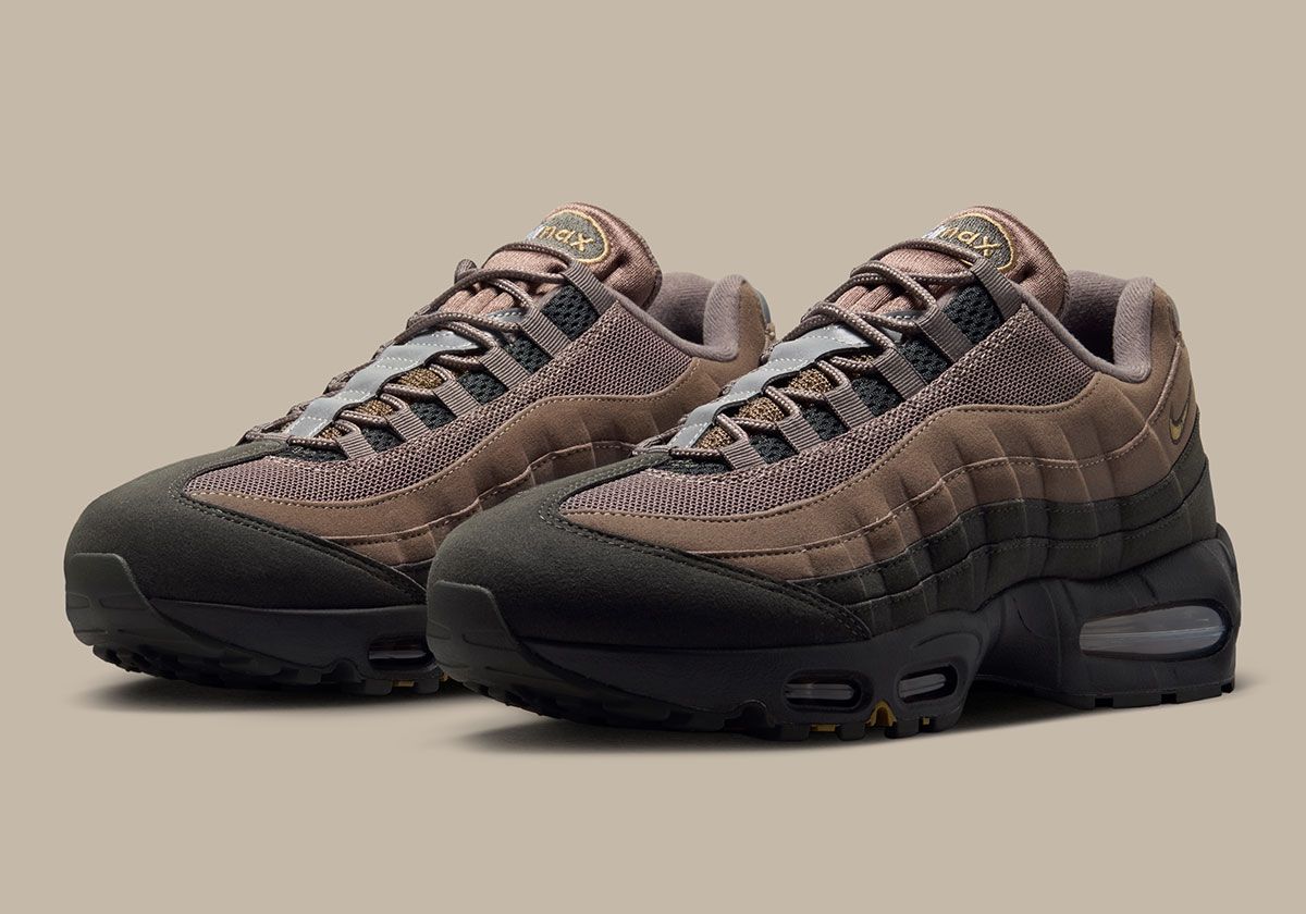 Nike Air Max 95 in Mink Brown gradient with chocolate ombre upper and blue Air units, shown from lateral side view