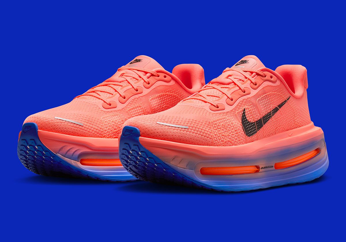 Nike Vomero Premium in Crimson and Blue colorway with gradient midsole detail and repositioned Nike Run tongue emblem