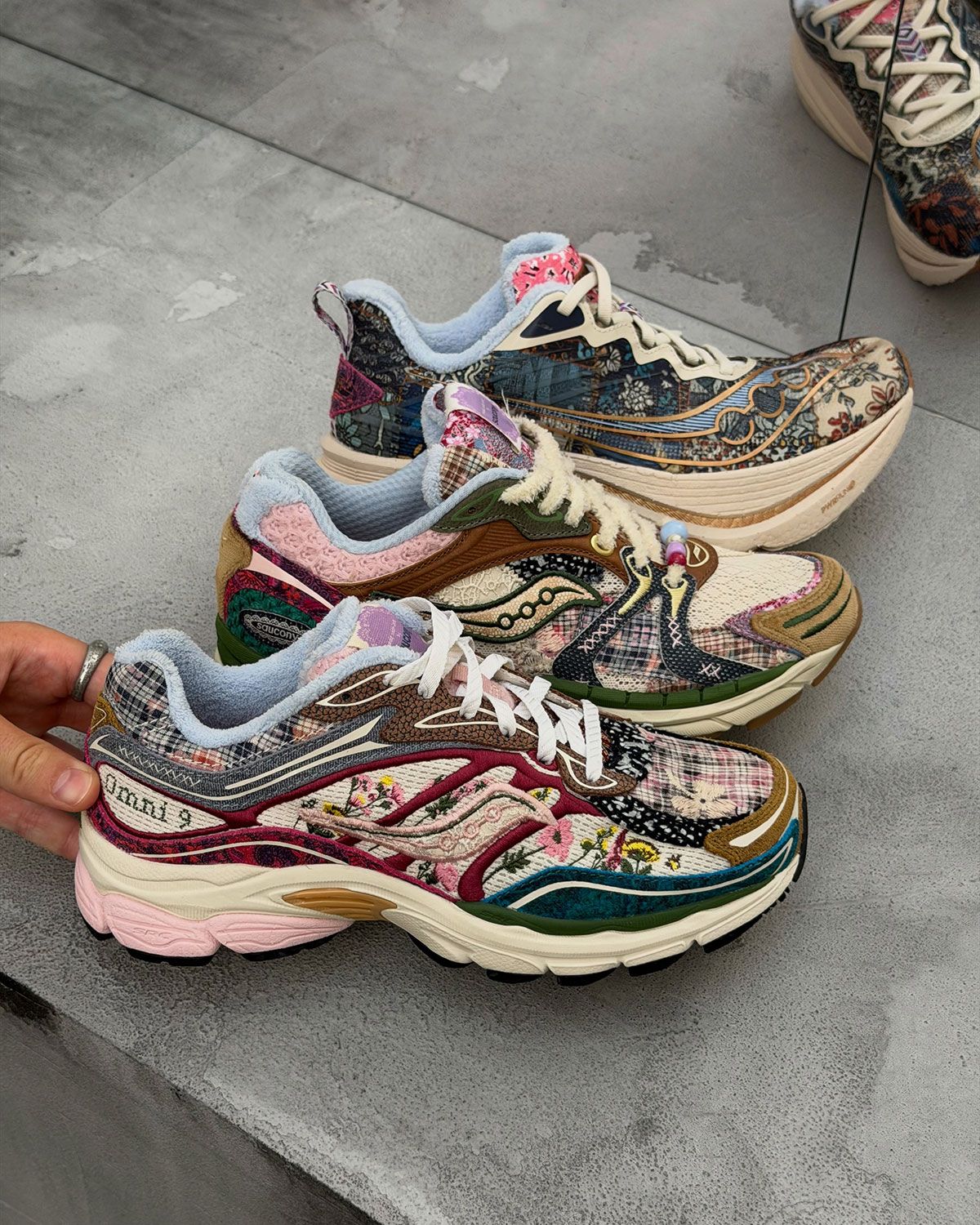 Saucony Spring/Summer 2027 collection preview at Paris Fashion Week featuring Progrid and Endorphin models with cross-stitch design details