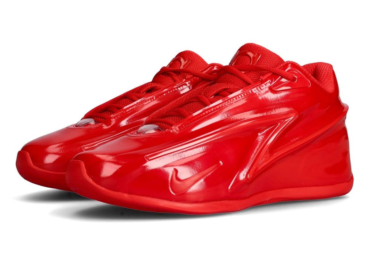 Nike KD 19 'Candy Apple' in University Red, showing the full lateral and medial views of the silhouette with distinctive lightning-bolt side panel