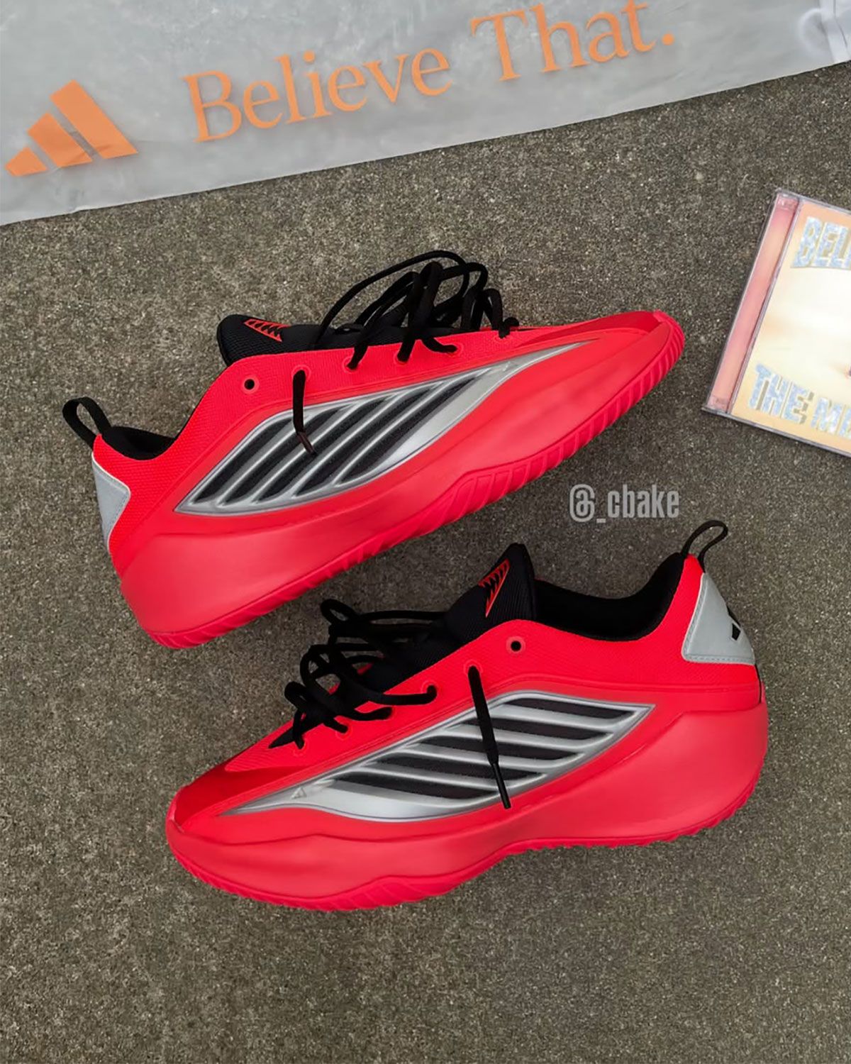 Adidas Believe That 1 in Georgia Bulldogs red sample colorway, showing full lateral and medial shoe design with red upper and matching accents