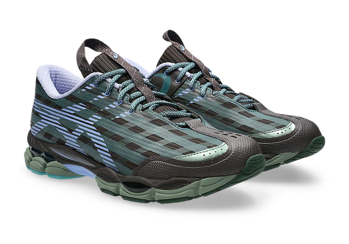 Kiko Kostadinov x ASICS US-8 SJ33 in Roasted Coffee and Periwinkle Blue colorway, showcasing checkered upper and oversized Tiger Stripe detailing
