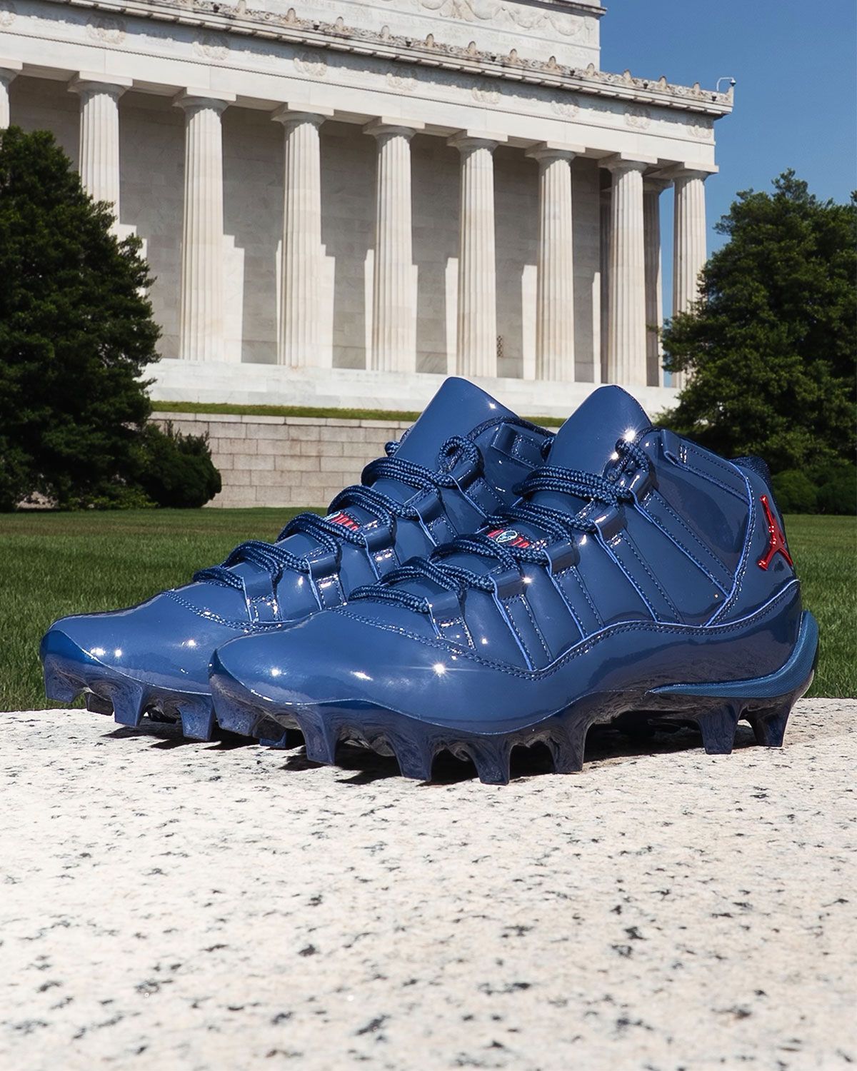 Air Jordan 11 TD Howard Bisons in blue patent leather with red Jumpman logo and bison head tongue emblem