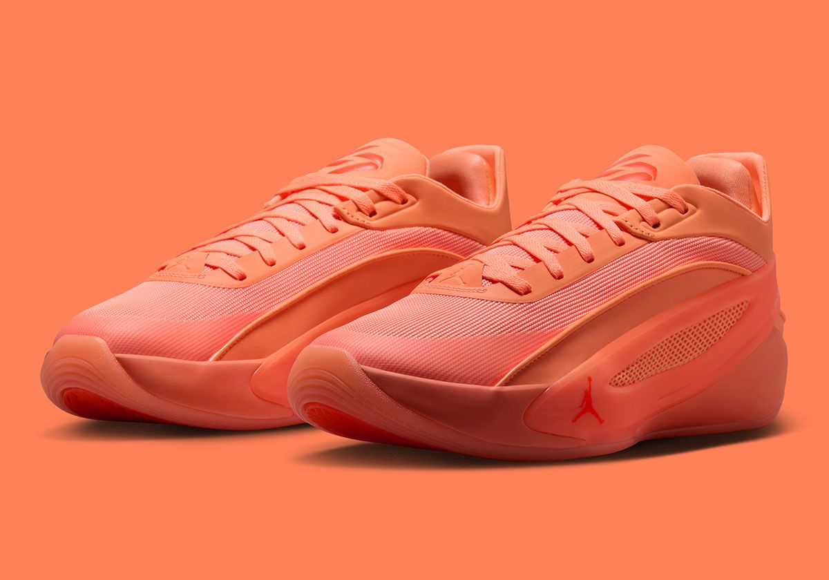 Jordan Luka 5 in Orange Pulse and Hyper Crimson colorway, side profile view