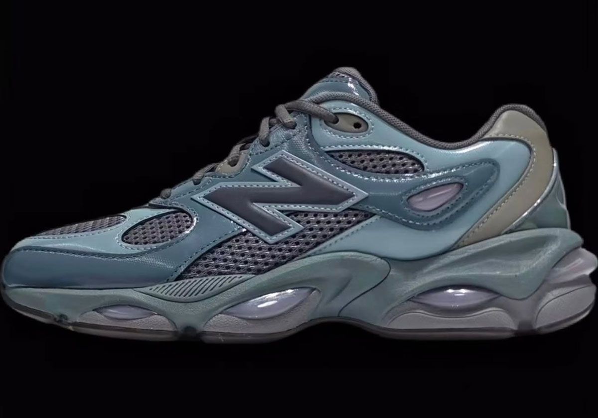 New Balance 983 side profile showing bulbous ABZORB cushioning pods and glossy synthetic upper with wavy design
