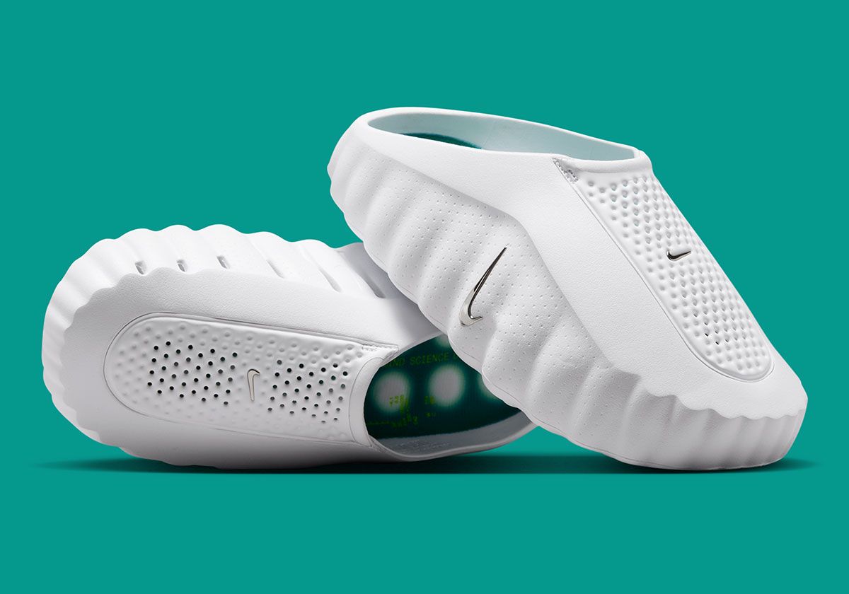 Nike Mind 001 Triple White sneaker featuring all-white upper with metallic silver branding accents and pod-based midsole, shown from multiple angles