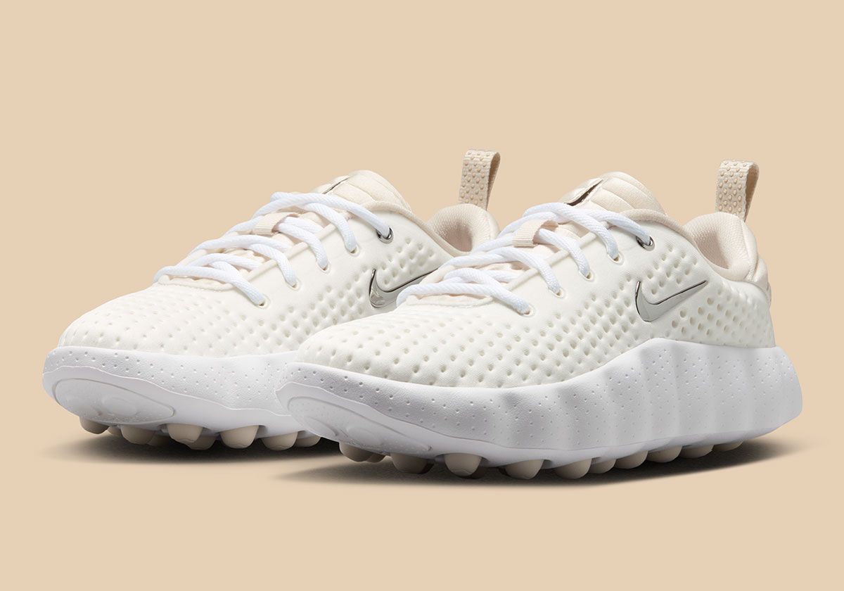 Nike Mind 002 Summit White women's sneaker with Phantom midsole and Light Orewood Brown foam nodes, tongue, and heel tab
