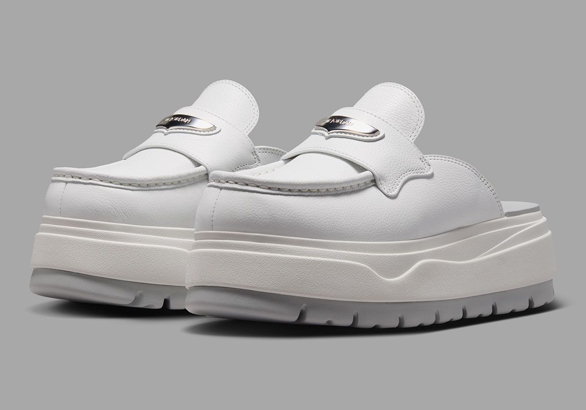 Air Jordan Mule in Summit White leather with Metallic Silver emblem and oversized white platform midsole