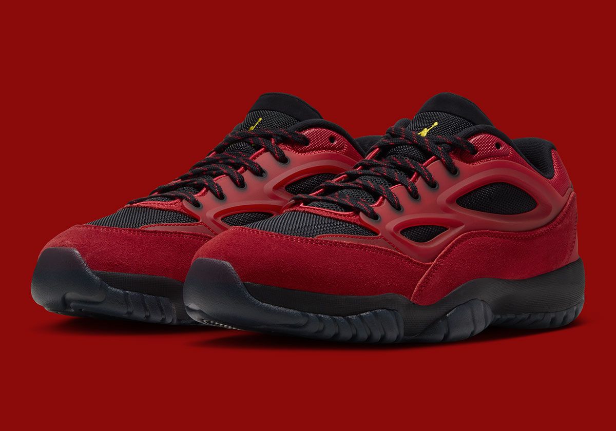 Jordan DMSN 95 Reverse Bred showing fire red suede mudguards and yellow branding accents on jet black base