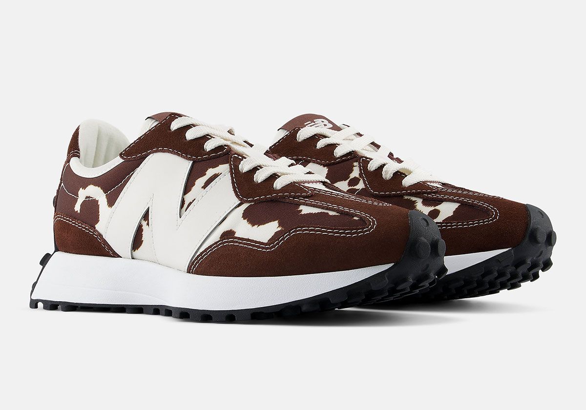 New Balance 327 Cow Print pack in black and brown colorways, featuring printed cow print graphics on nylon uppers