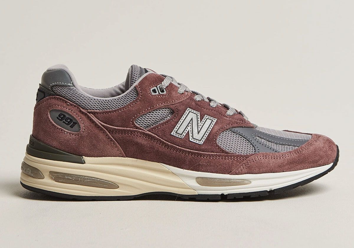 New Balance 991v2 Rose Taupe with suede and grey mesh construction, side profile view