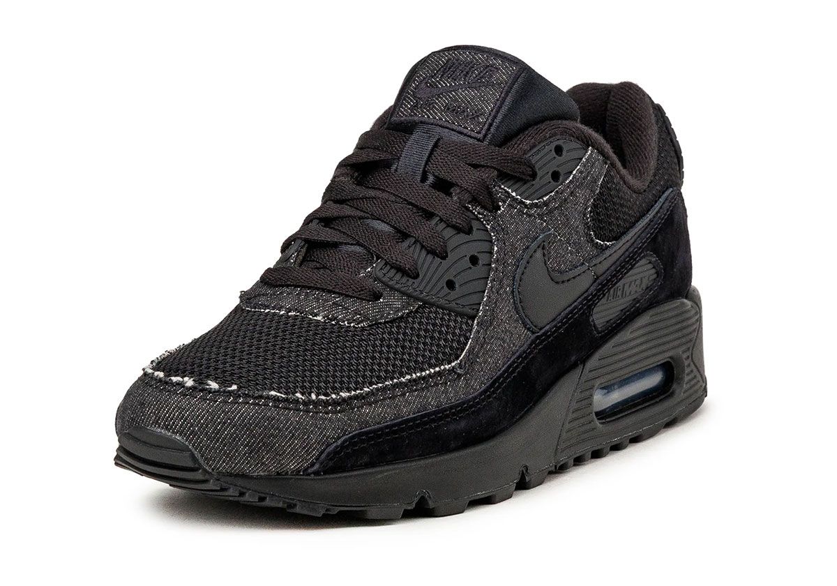 Nike Air Max 90 Black Denim featuring distressed denim sidewalls, suede overlays, and red hangtag