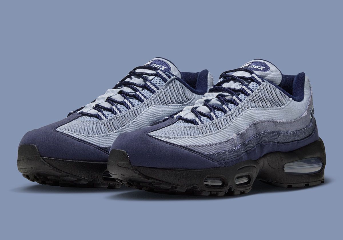 Nike Air Max 95 Ashen Slate displaying gradient denim construction across side overlays with light blue, medium, and dark denim tones