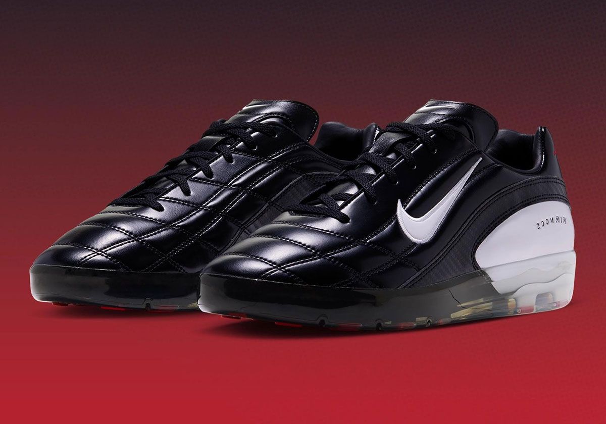 Nike Air Zoom M9 Cryoshot in black leather with white Swoosh and carbon fiber accents, honoring Mia Hamm's World Cup legacy
