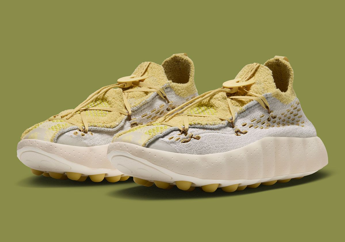 Nike Mind 002 Flyknit in Light Bone and Saturn Gold colorway, showing Flyknit upper and articulated foam midsole
