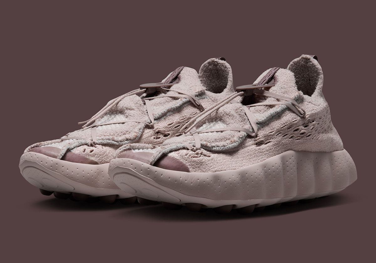 Nike Mind 002 Flyknit in pale Sanddrift colorway with brown pod detailing