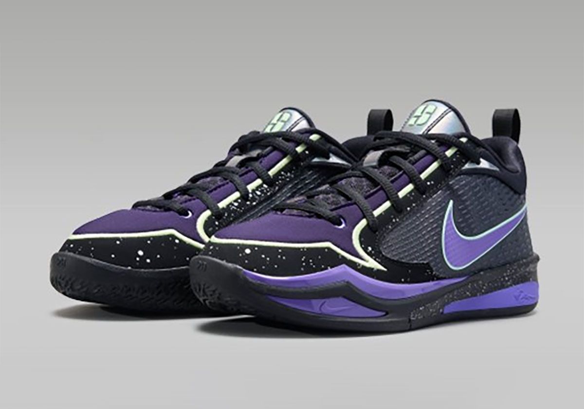 Nike Sabrina 4 in black, purple, and yellow colorway with paint splatter details and Mardi Gras-inspired accents for kids