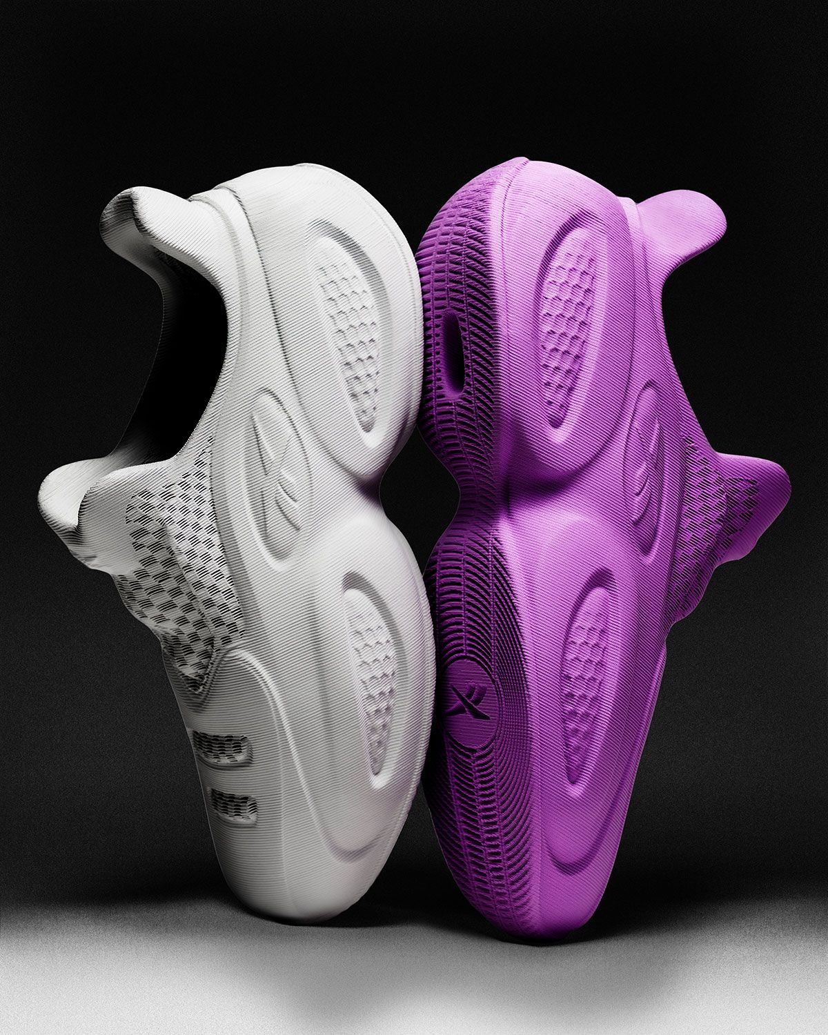 Reebok x Zellerfeld Question 96/26 in white and purple colorways, featuring 3D-printed midsole windows and hexagonal geometric detailing